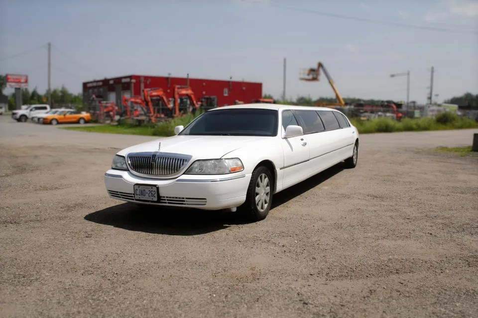 White limousine from the Rolling Luxury image library — representative vehicle